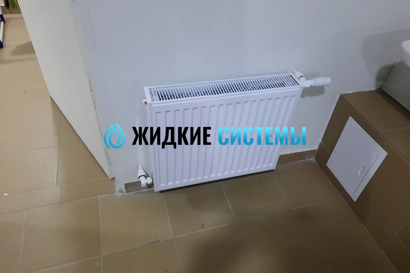 Монтаж радиатора для душевой комнаты в общежитии